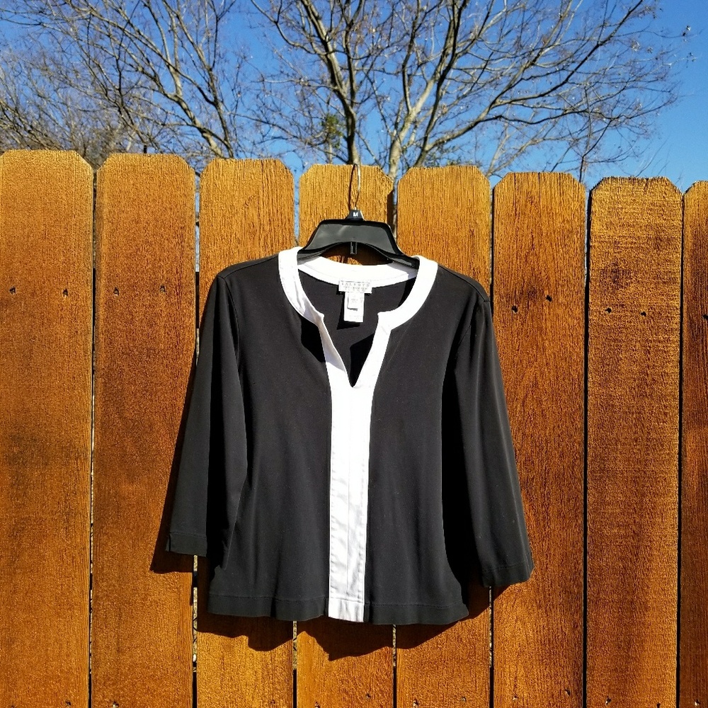 Black and white sweater/blouse.